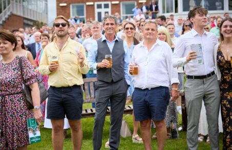 Racegoers Cheering at Newbury Racecourse